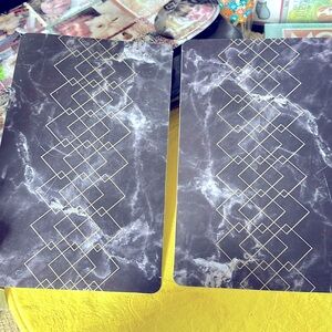 Two placemats.black in color. Very strong.